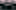 gray Nissan Rogue SUV outdoor during nighttime by Matthijs Waanders is licensed with Unsplash License